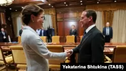 Спикер сената парламента Казахстана Дарига Назарбаева и премьер-министр России Дмитрий Медведев. Москва, 23 октября 2019 года.